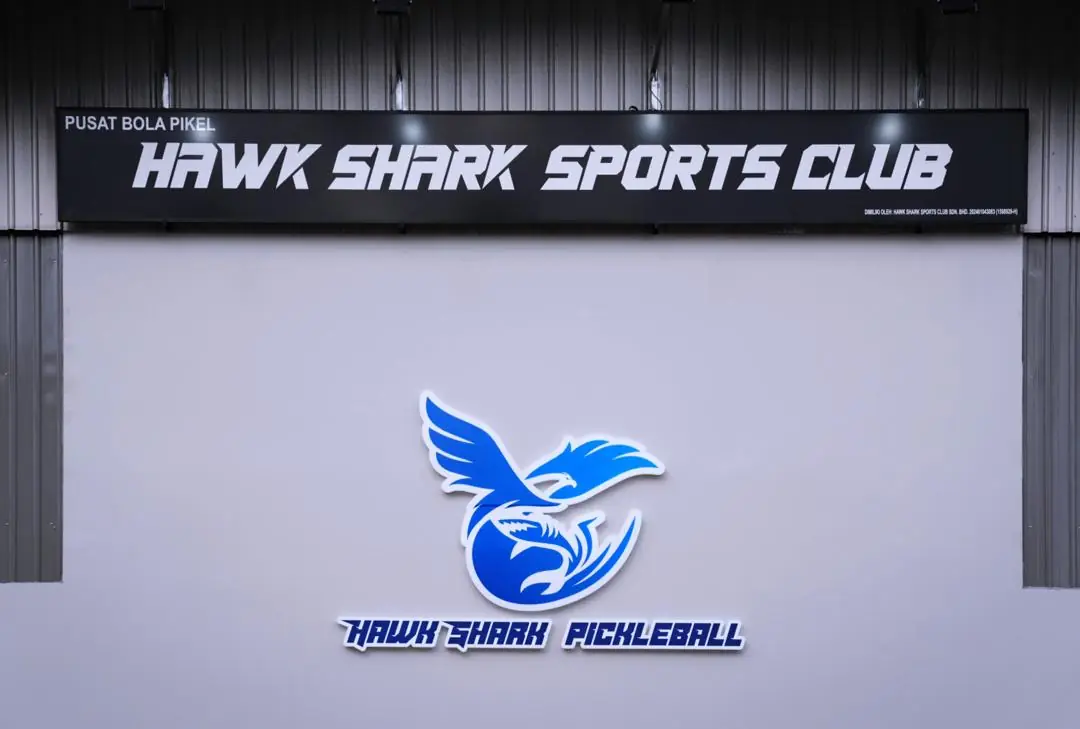 Hawk Shark Sports Club signage and emblem