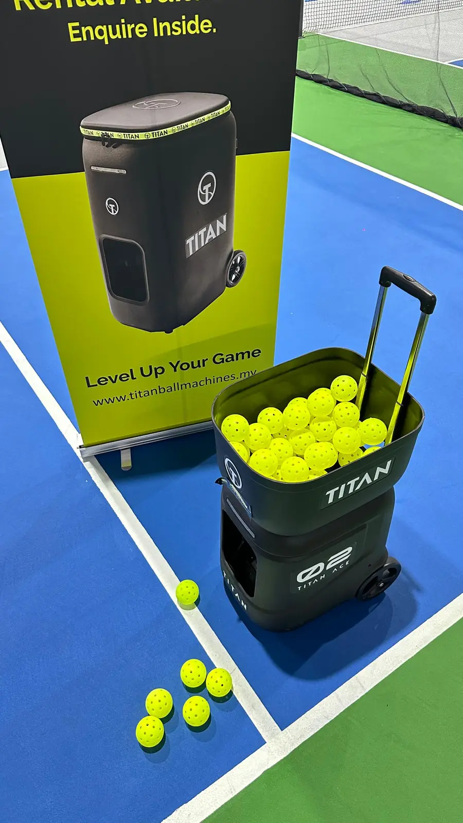 TITAN ball machine on court