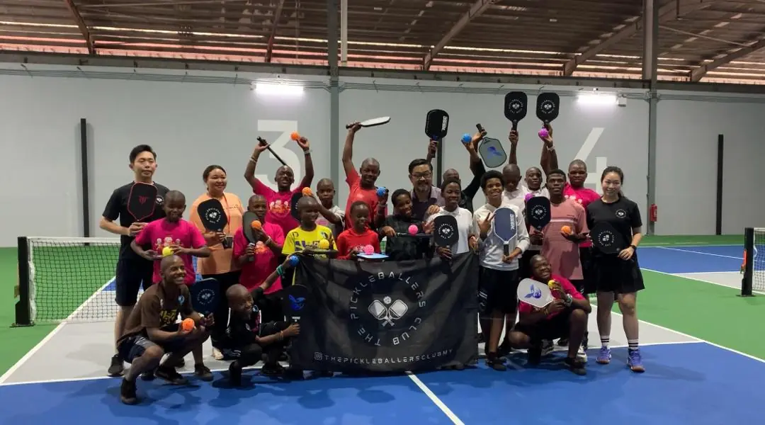 Community pickleball session with young players